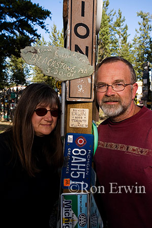 Ron and Lori Erwin in  Signpost Forest, YT